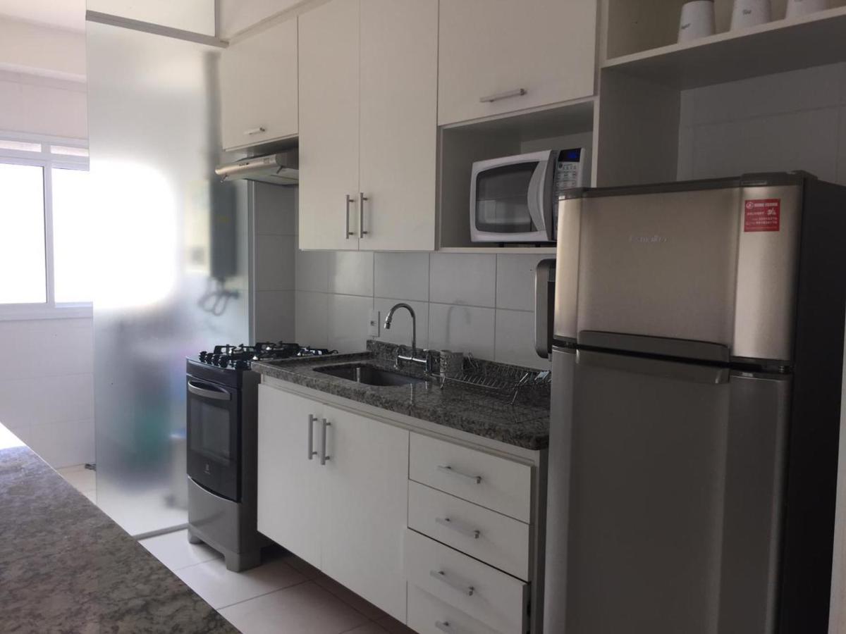 Apartamento Villa Di Fiori Enseada Гуаружа Экстерьер фото